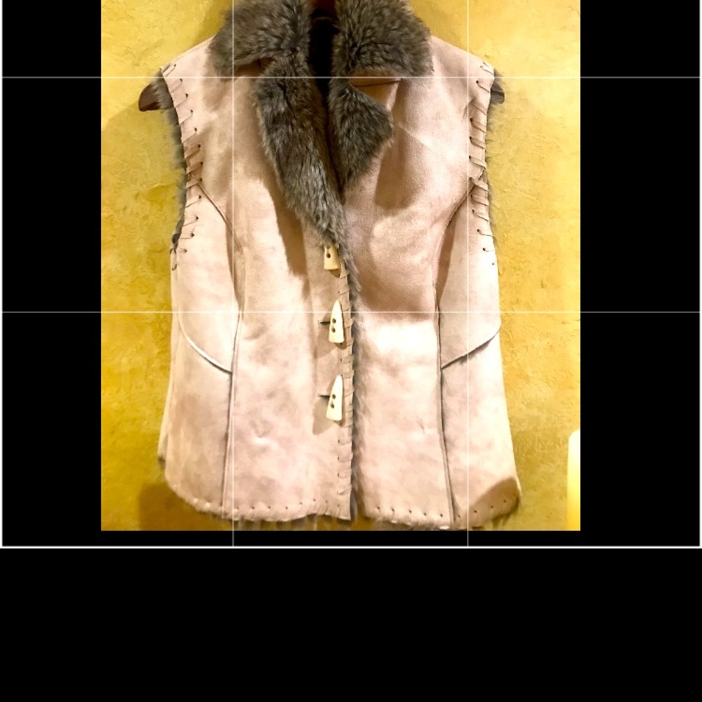 Nude vest, fake bone buttons, w/ faux fur inside that’s so warm!